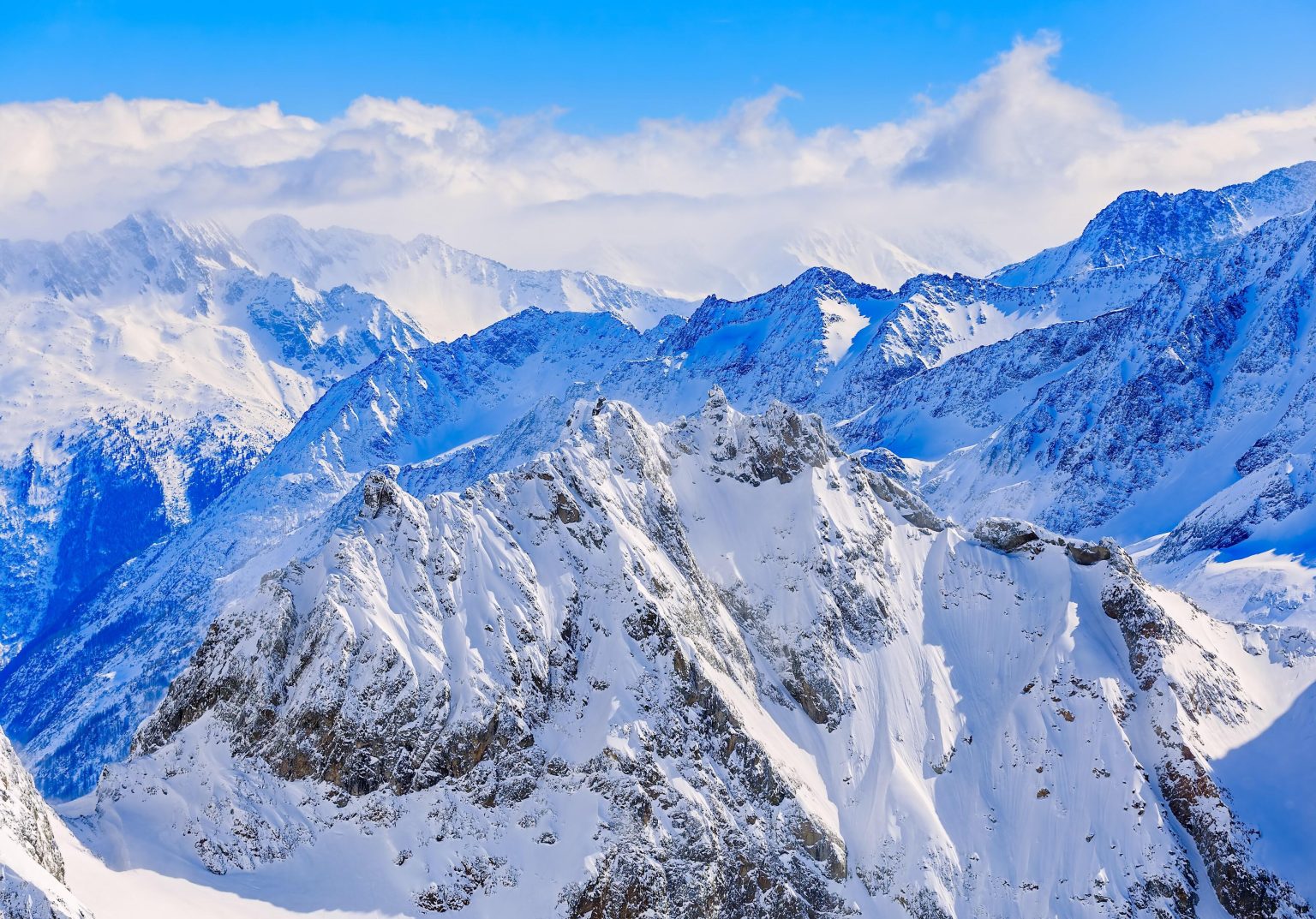 Views of mountains from the summits